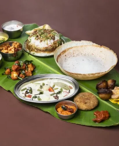 Appam, Biriyani, Snacks in a Banana Leaf